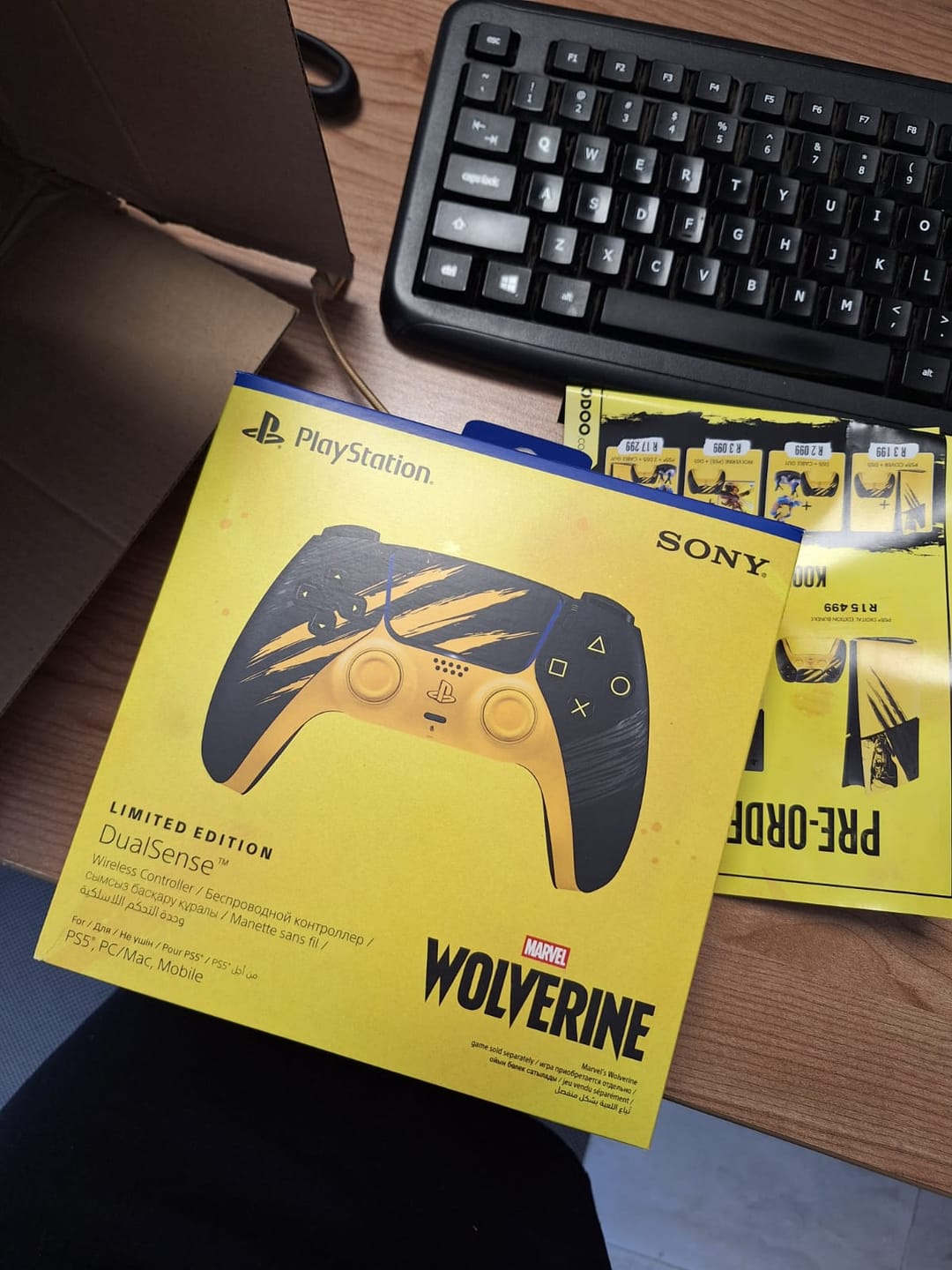 Customer photo review of PlayStation 5 (PS5) DualSense Wireless Controller - Marvel’s Wolverine Battle Yellow Limited Edition