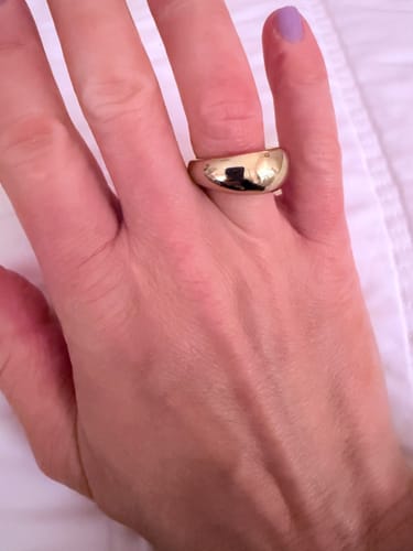 Customer's gold Chunky Dome Ring worn on a finger