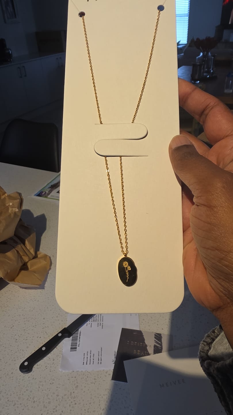 Customer photo review of 18k Gold Plated Birth Flower Necklace