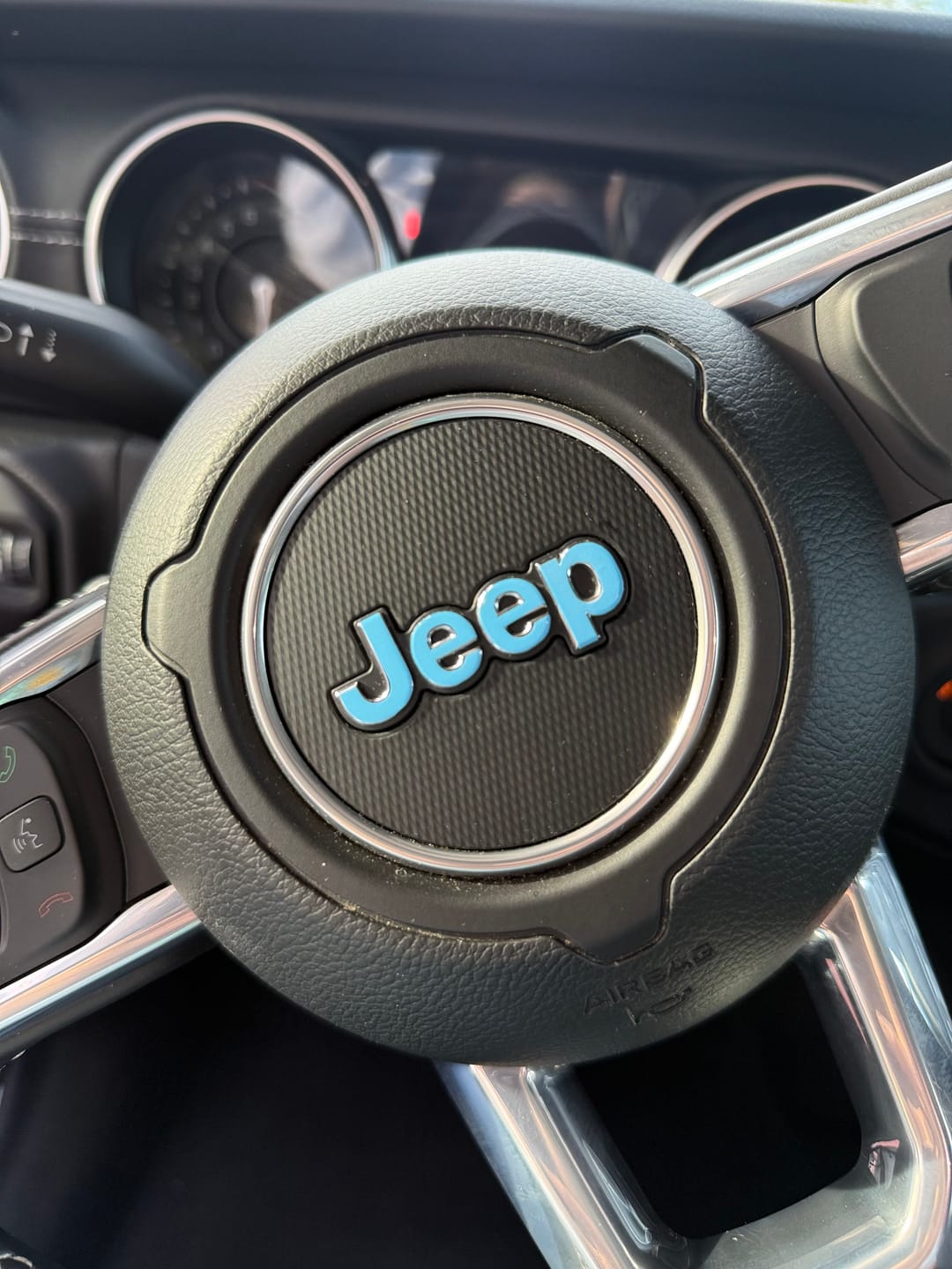 Customer photo review of JEEP Steering Wheel Emblem Overlay Decal — 30+ Colors & Designs (Flag, Topo, Animal, Solid)
