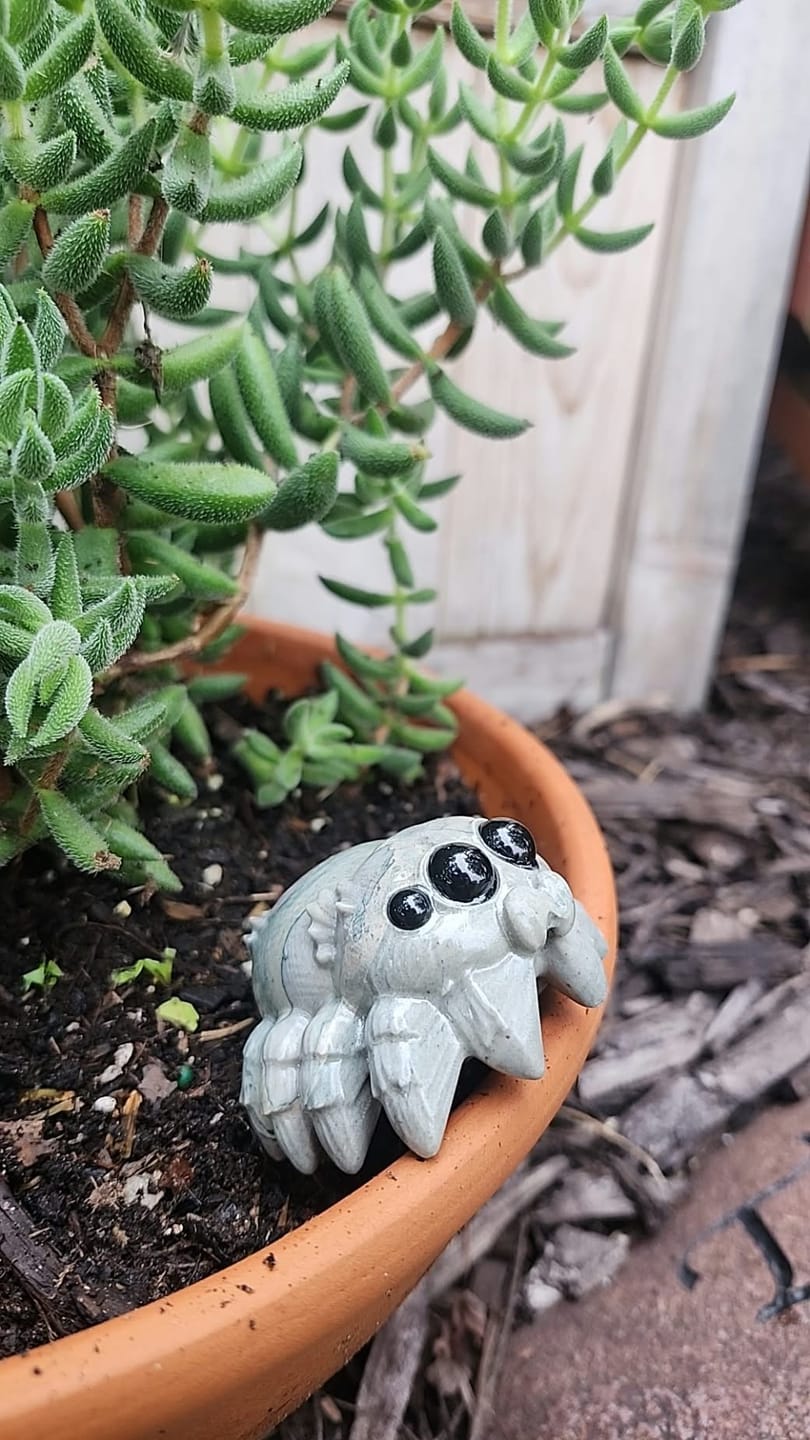 Customer photo review of A Slightly Imperfect Natural Crystal Carving Playful Chibi Spider