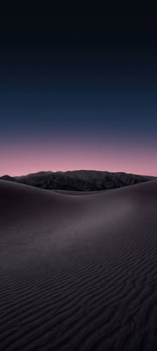 Customer's landscape view showing desert sand dunes under a dusk sky, not displaying the Golden Cup Blend coffee.