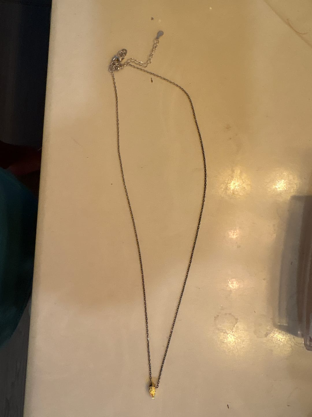 Customer photo review of Always Near Angel Wing Necklace
