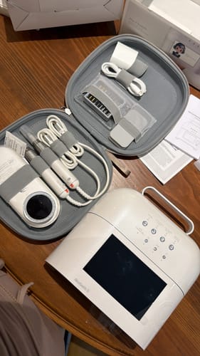 Customer's white ONAIL Nail Drill Pro Max set, including the main control unit, two handpieces, and accessories in a case.
