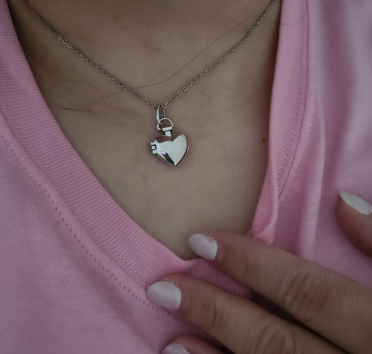 Customer photo review of Memento Sacred Heart Locket Necklace