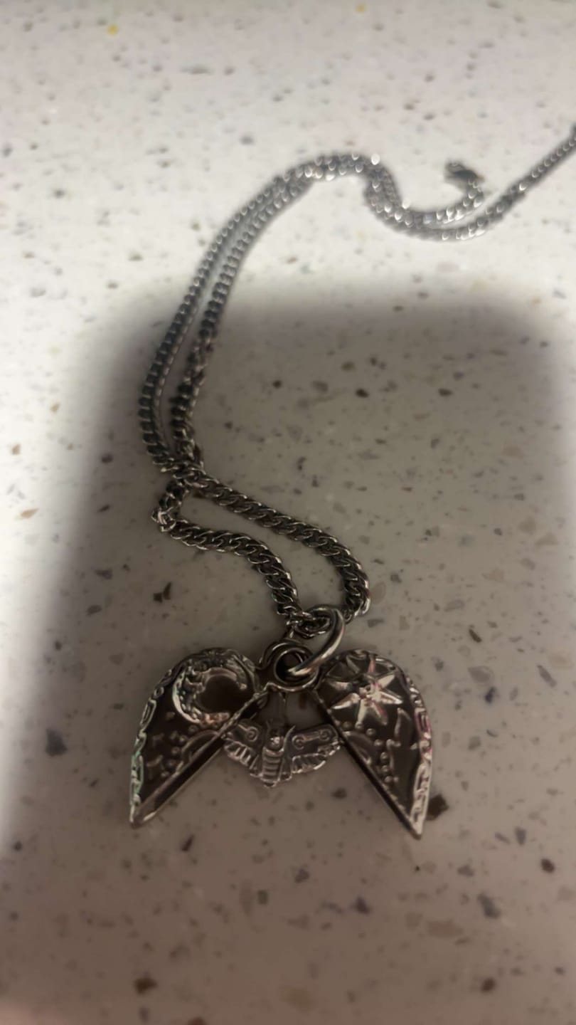 Customer photo review of COSMIC HEART PENDANT