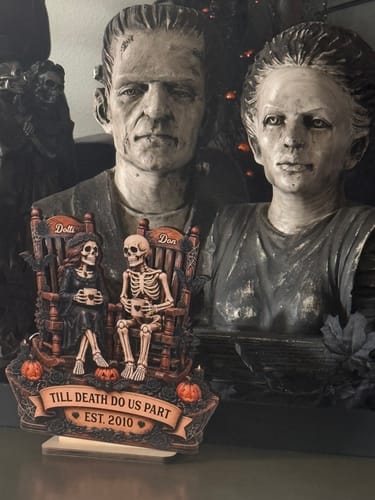 Customer's Till Death Do Us Part Skeleton Couple plaque displayed next to large Frankenstein and bride busts.