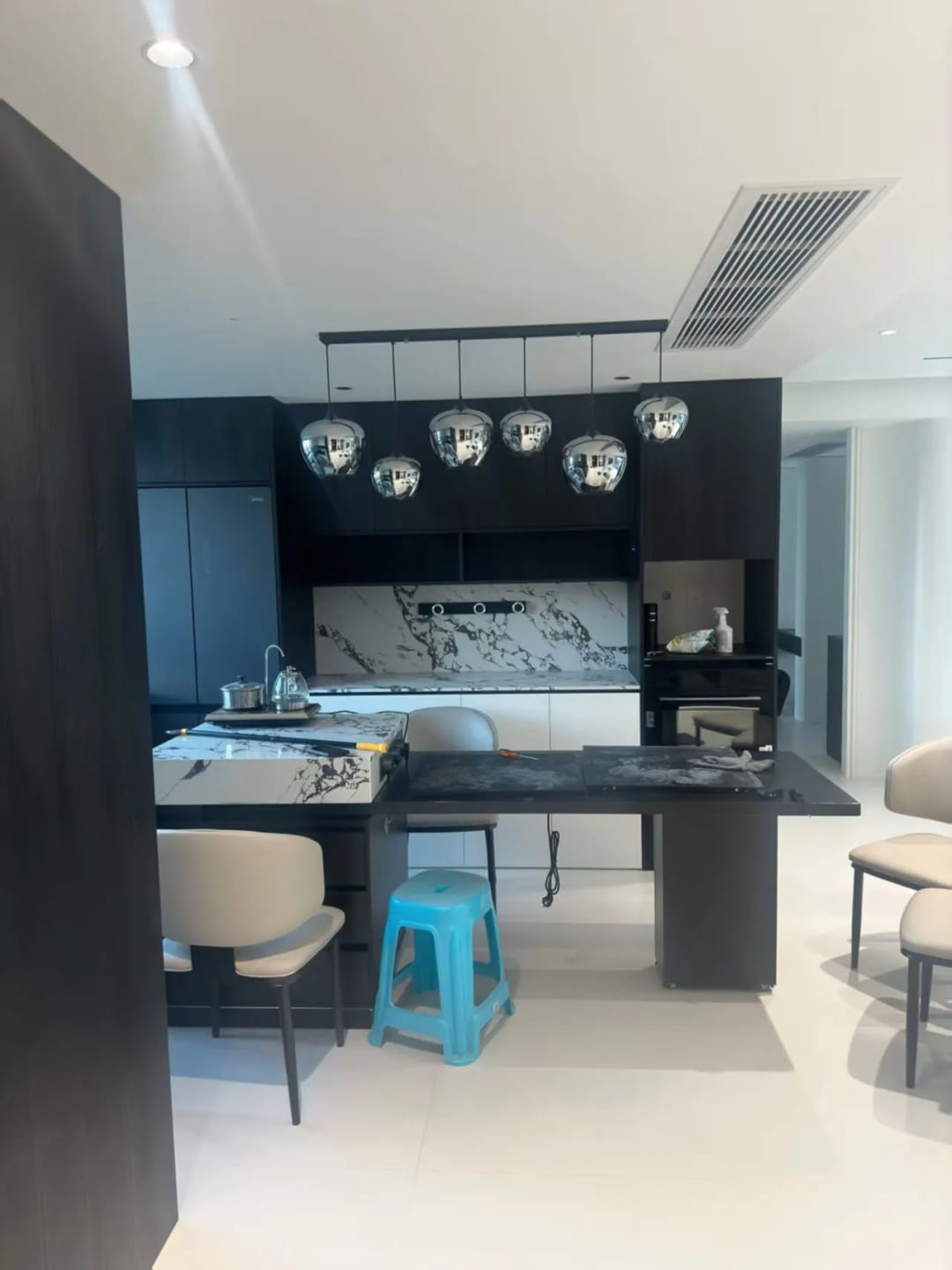 Customer photo review of Bottle Pendant Light, Hand-Blown Smoke Gray Glass, Black, E27
