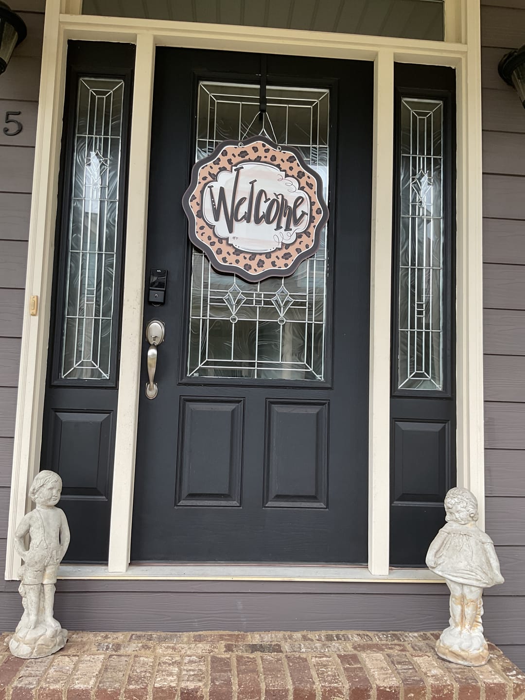Customer photo review of Leopard Cheetah Welcome Door Hanger