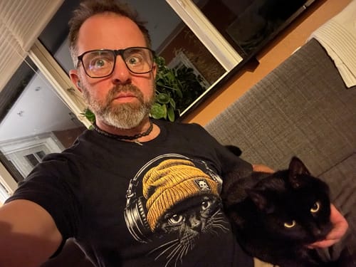 Joel P. wearing Bass Cat