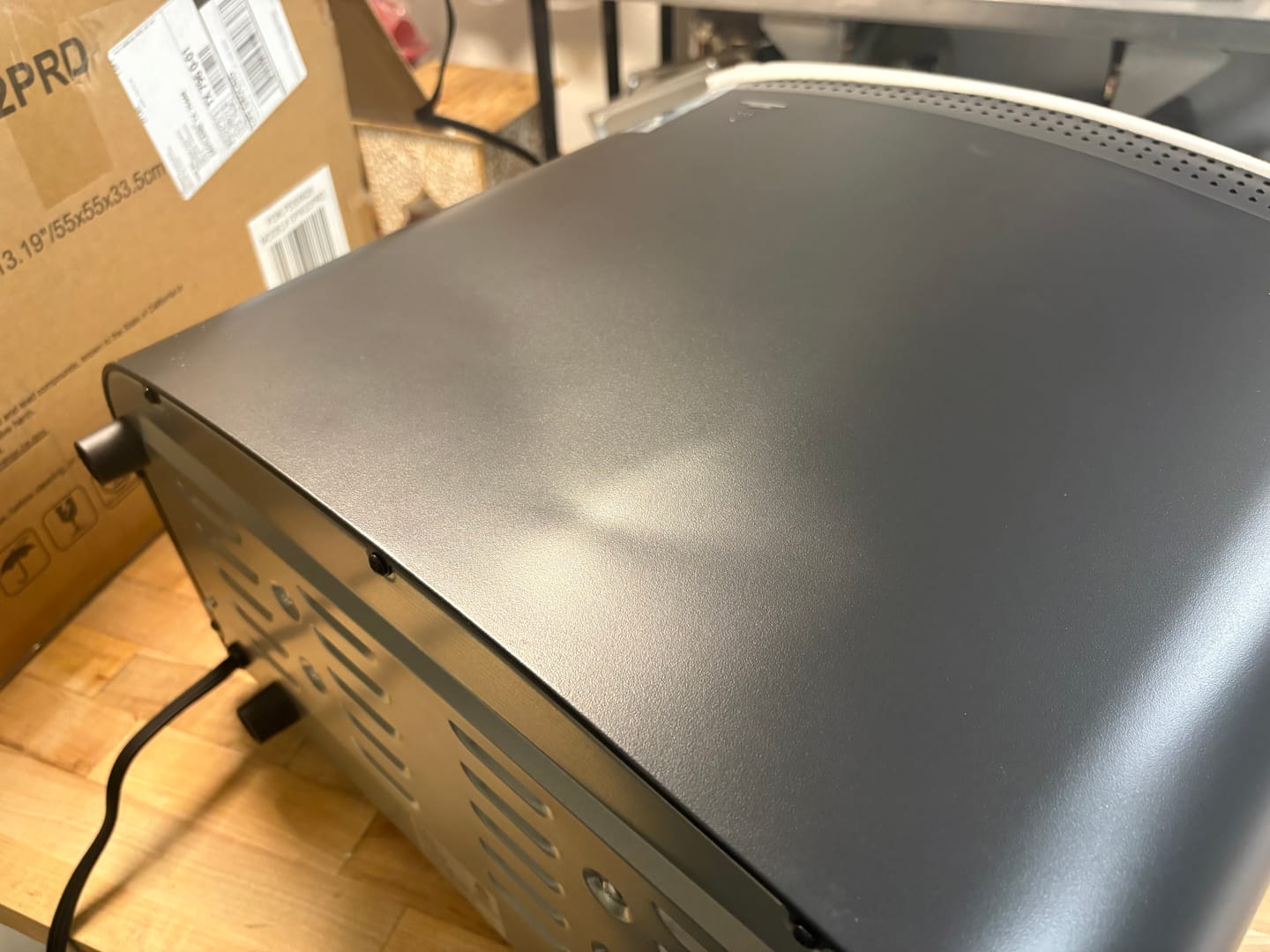 Customer photo review of 14" Indoor Electric Countertop Pizza Oven with 6 Preset Modes, Stainless Steel