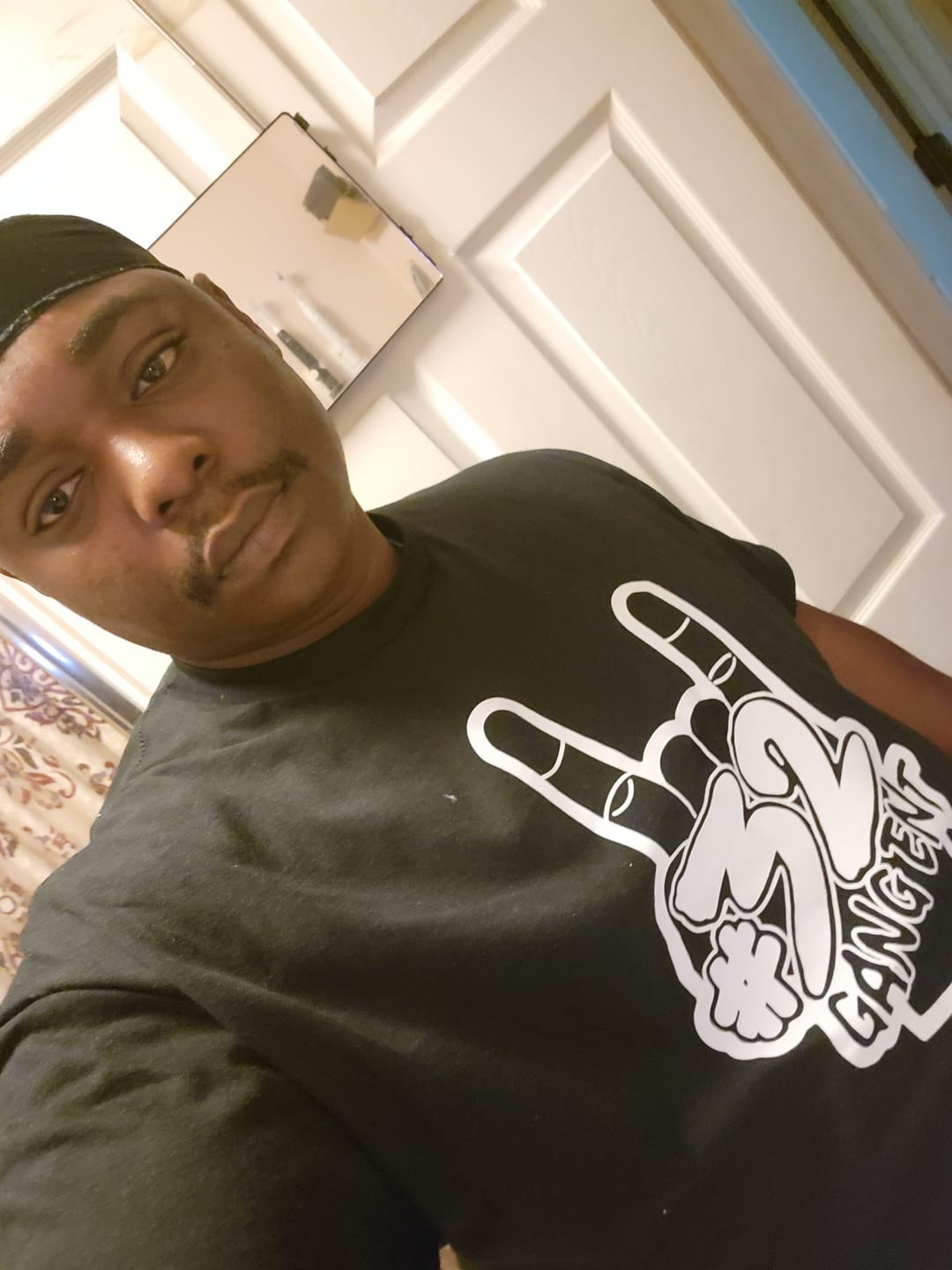 Customer photo review of 32 GANG BUDGET TEE