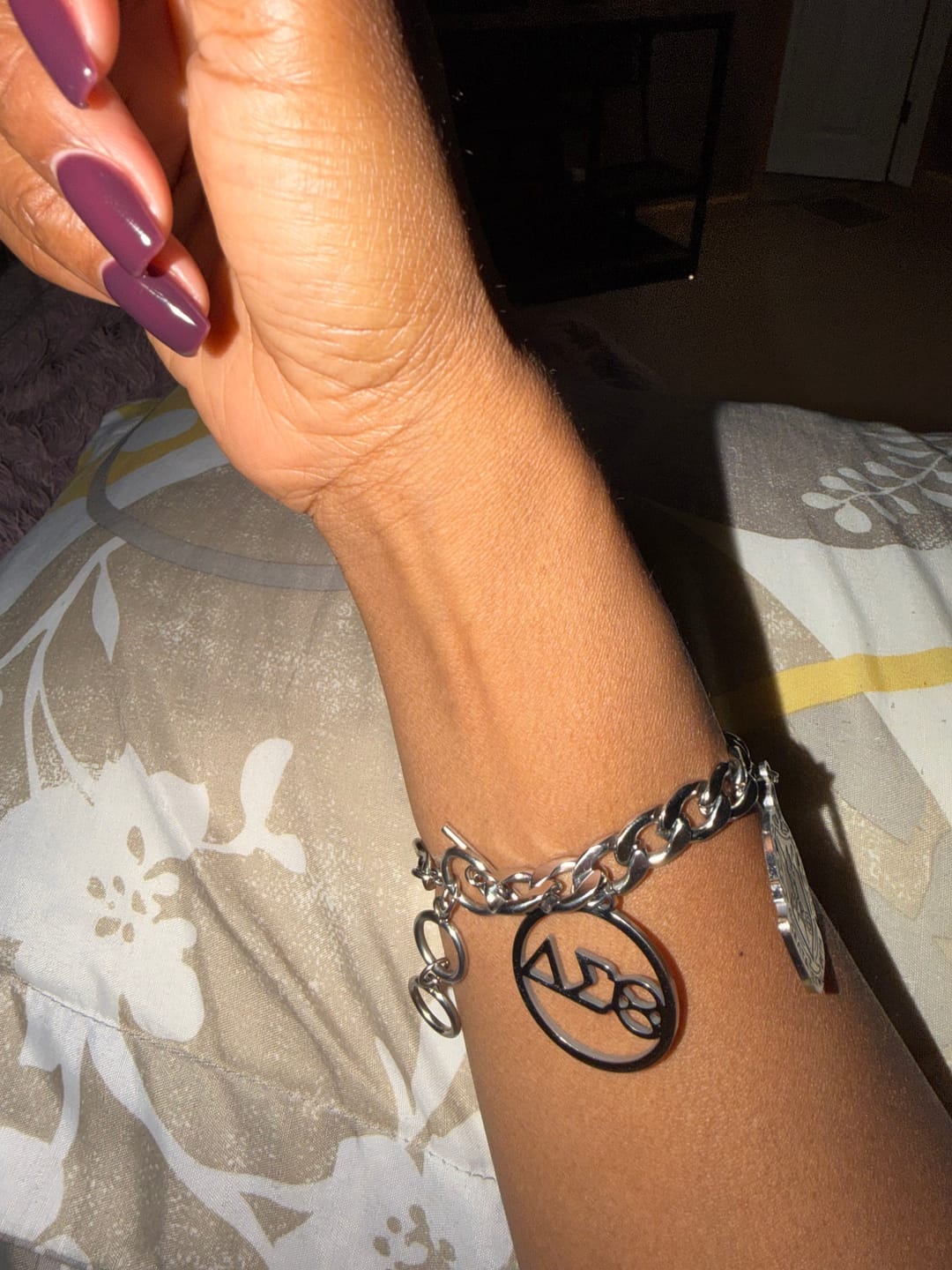 Customer photo review of Delta Sigma Theta - Multi Pendant Stainless Steel Bracelet - Silver