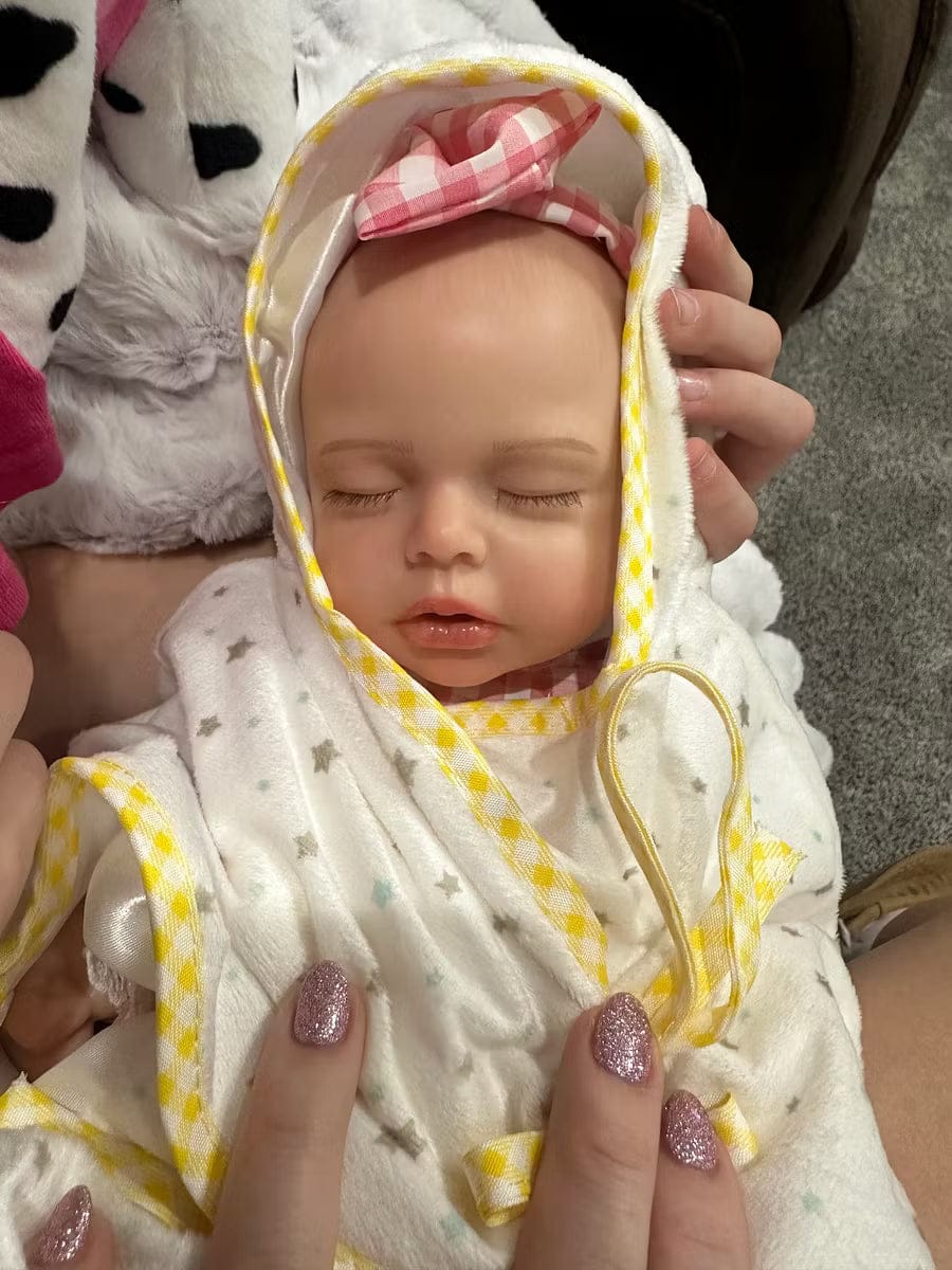 Customer photo review of Lucy — 16″ Realistic Silicone Sleeping Baby Doll