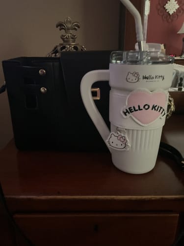 Customer photo review of Hello Kitty Foldable Mirror Stand Phone Case