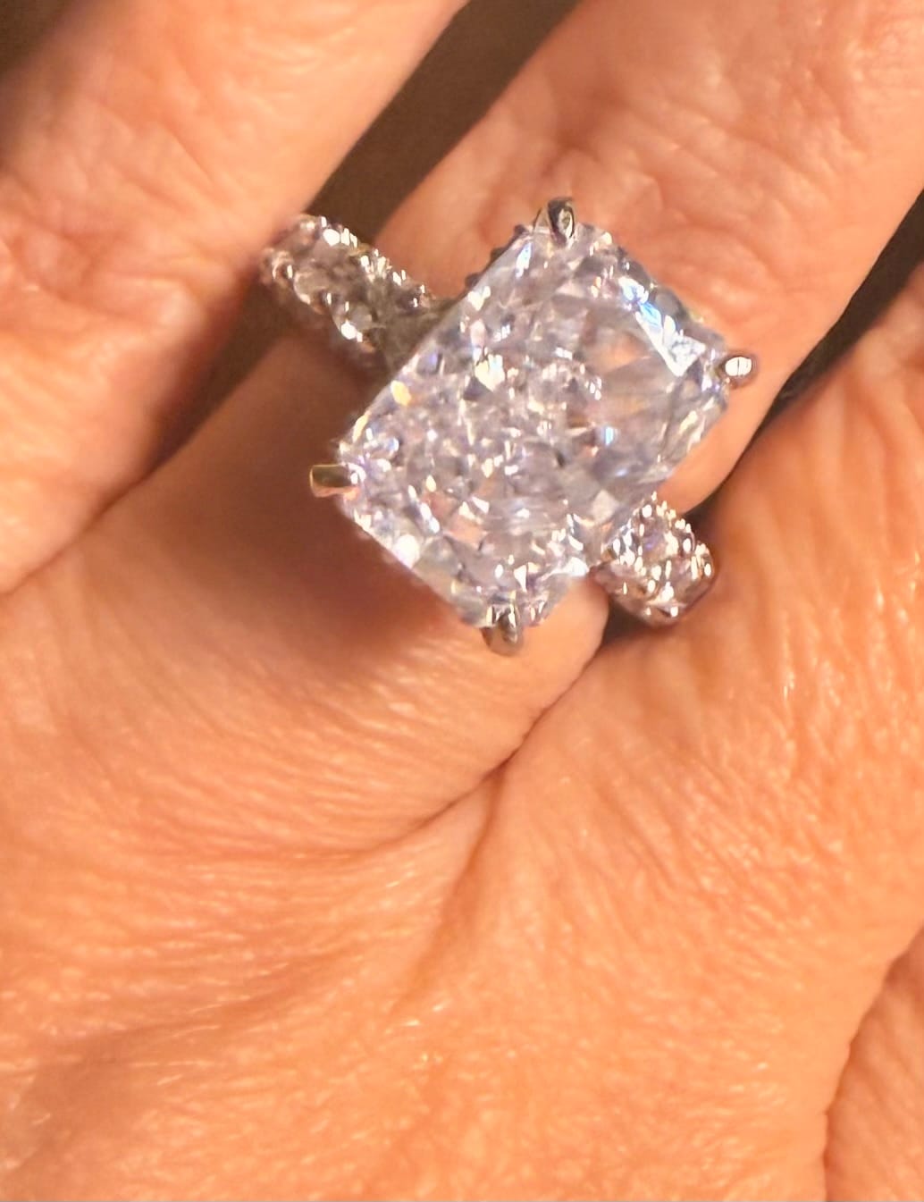 Customer photo review of Magnificent 8.0ct Radiant Cut Chunky Eternity Band with Pink Collar Engagement Ring In Sterling Silver