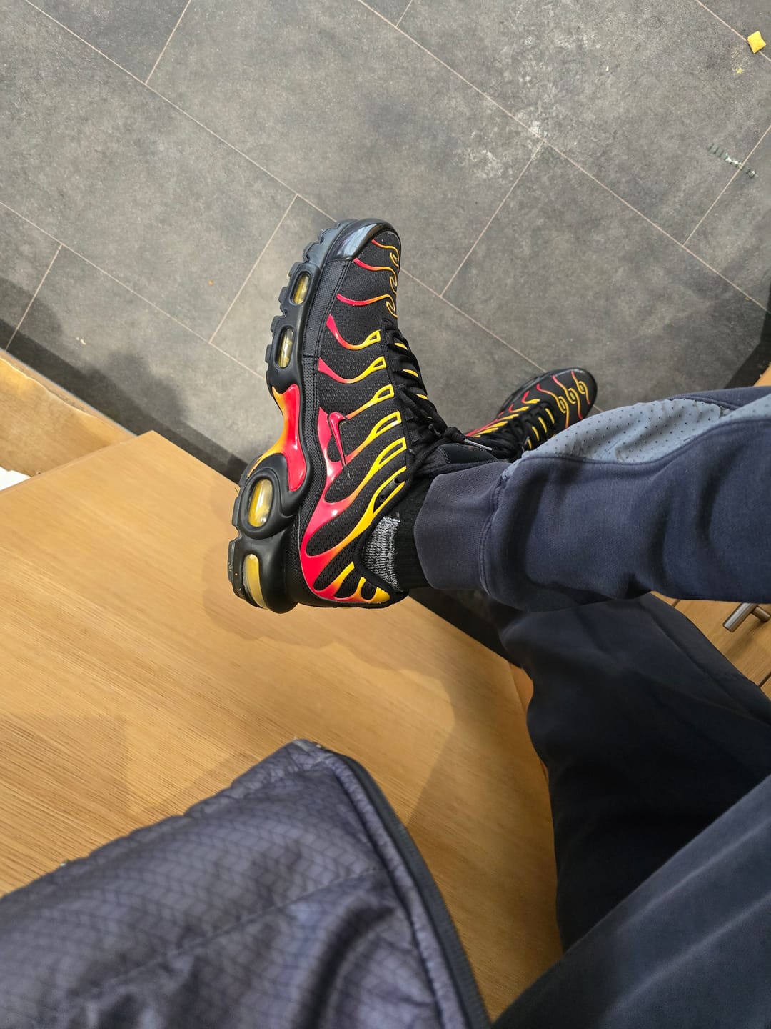 Customer photo review of Nike Air Max Plus TN 'Black University Gold Red'
