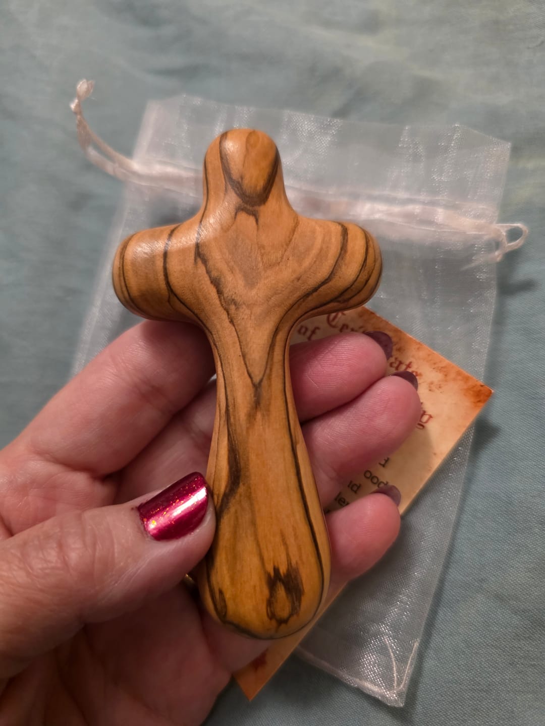 Customer photo review of Olive Wood Comfort Cross (Handheld)