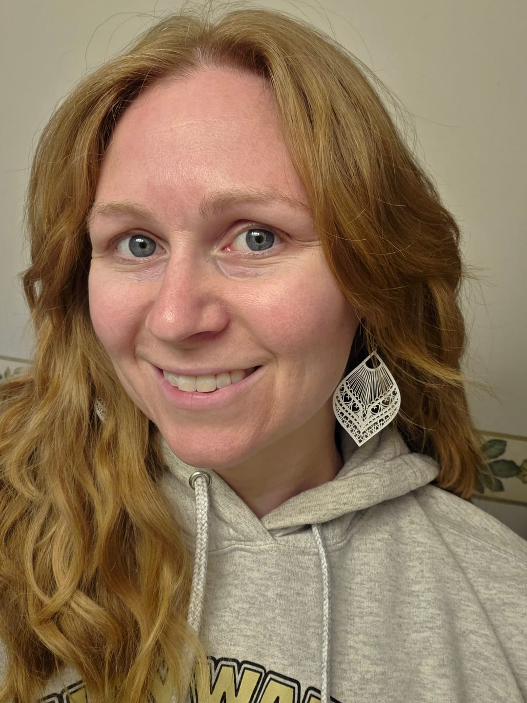 Customer photo review of Large Peacock Dangles Hypoallergenic Earrings for Sensitive Ears with Plastic Posts