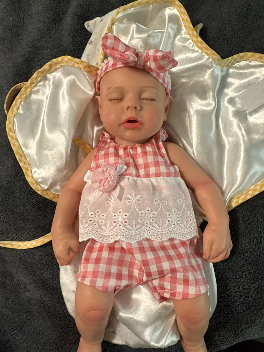 Customer photo review of Lucy — 16″ Realistic Silicone Sleeping Baby Doll