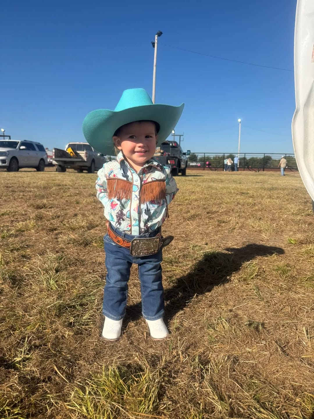Customer photo review of Turquoise Cowgirl Fringe LS Pearl Snap Onesie (0-18M)