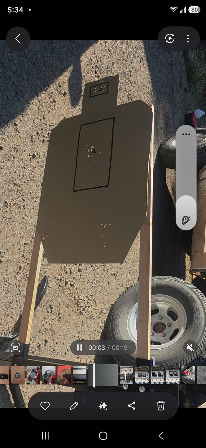 Customer photo review of Adjustable Swinger Target Stand for Paper & Cardboard Silhouette Shooting Target