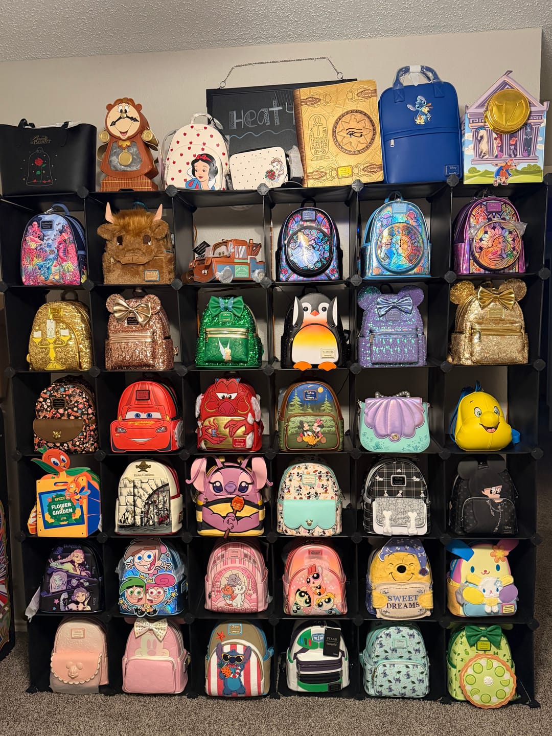 Customer photo review of Loungefly Disney Mulan Mushu Glitter Cosplay Mini Backpack