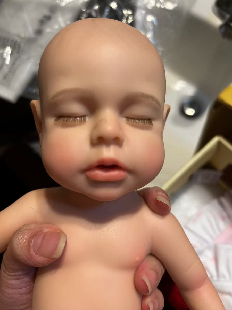 Customer photo review of Lucy — 16″ Realistic Silicone Sleeping Baby Doll