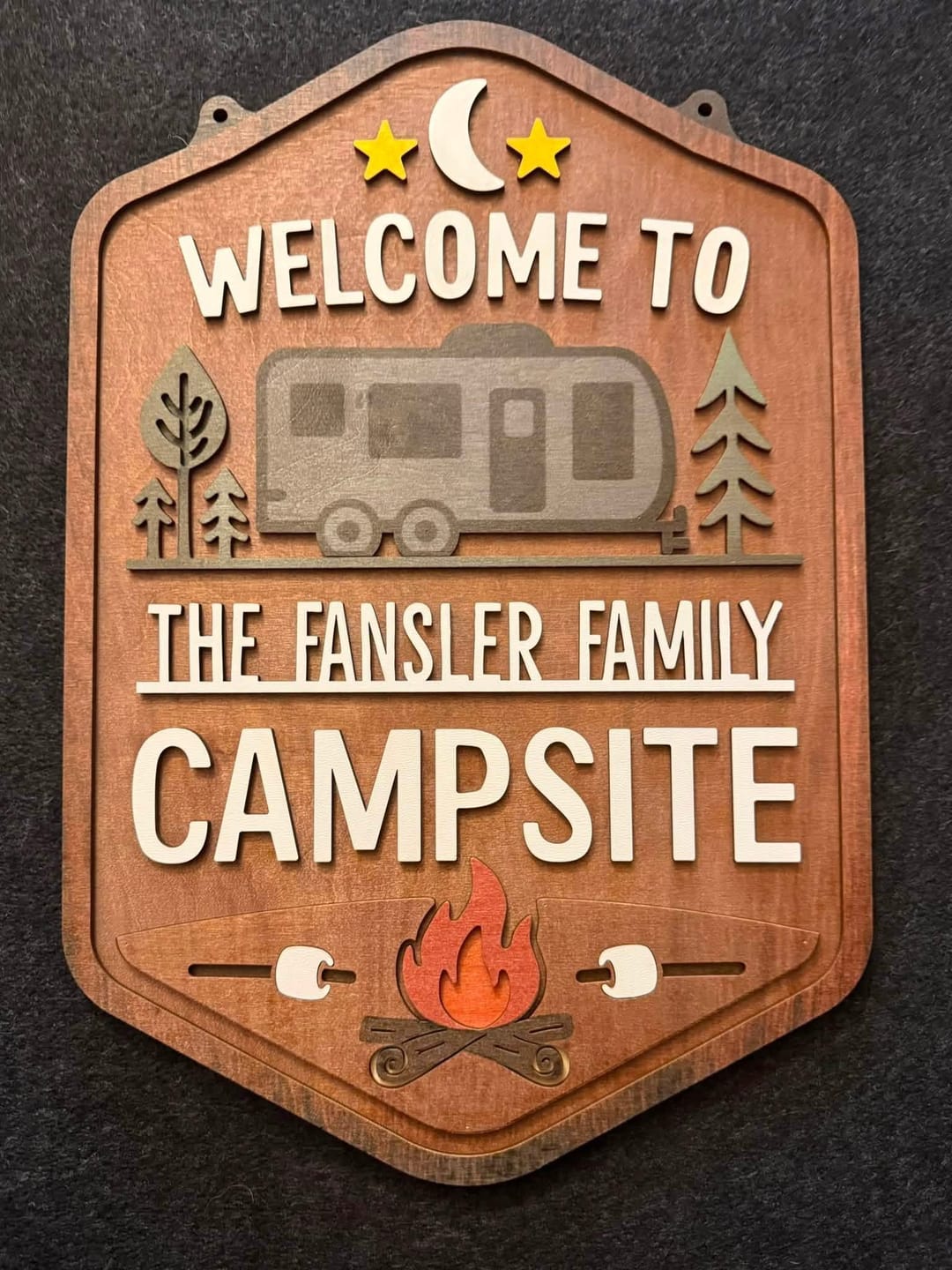 Customer photo review of Personalized Welcome To Our Campsite Sign - Camping Flag | Custom Family Name Camper Decoration (Travel Trailer)