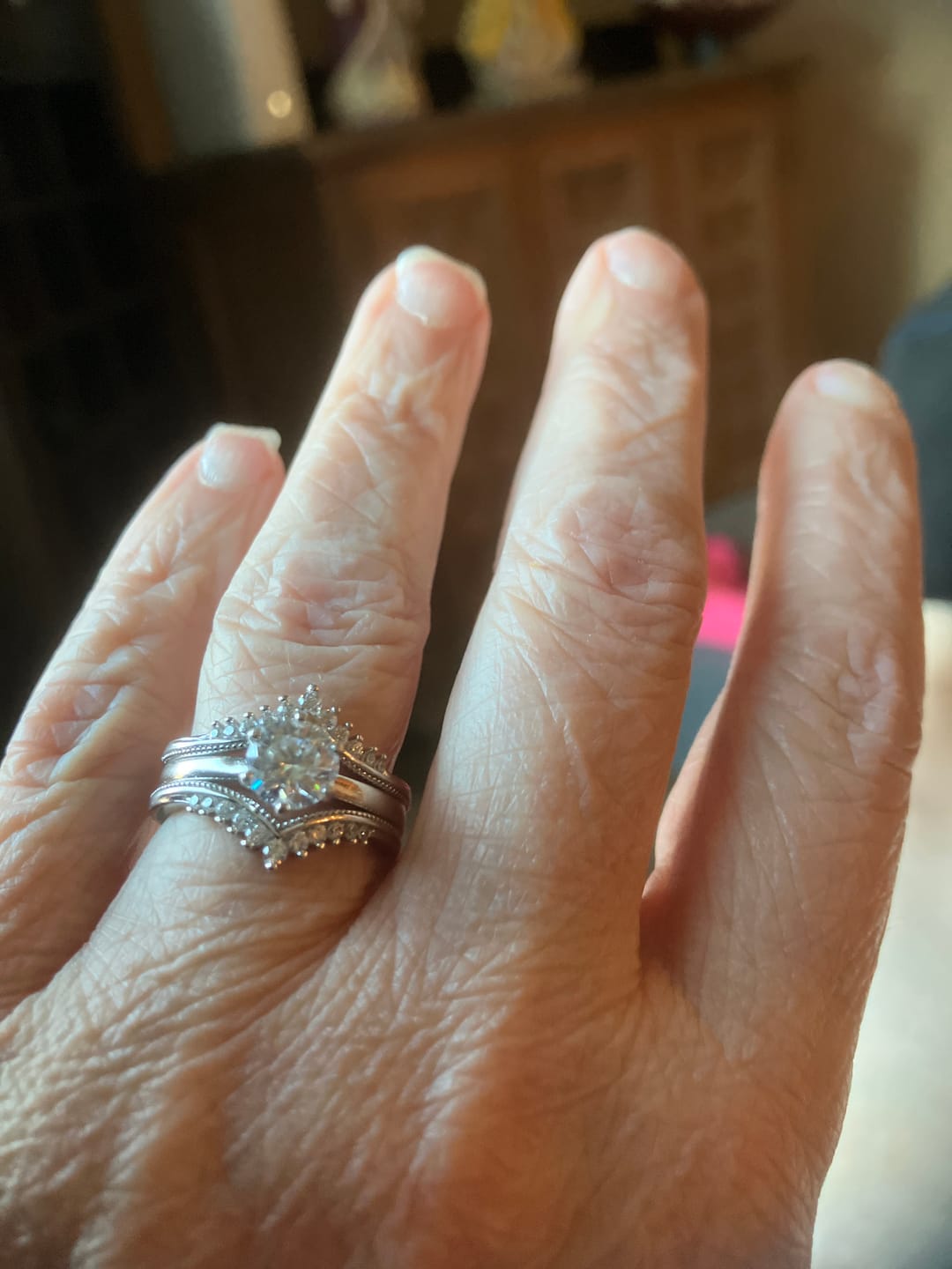 Customer photo review of Solitaire Moissanite With Enhancer Shank Bridal Engagement Ring Set