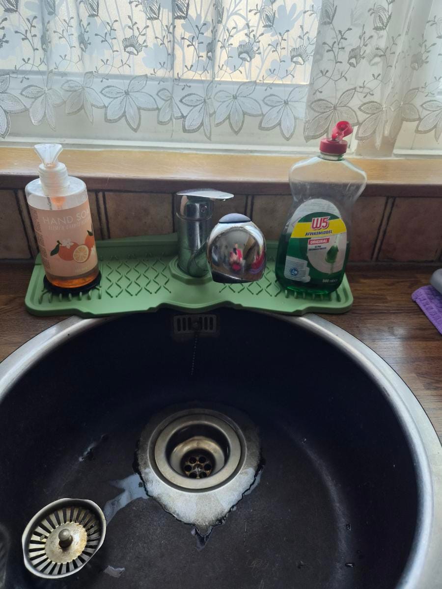 Customer photo review of Aqua Slope Rubber Faucet Sink Mat
