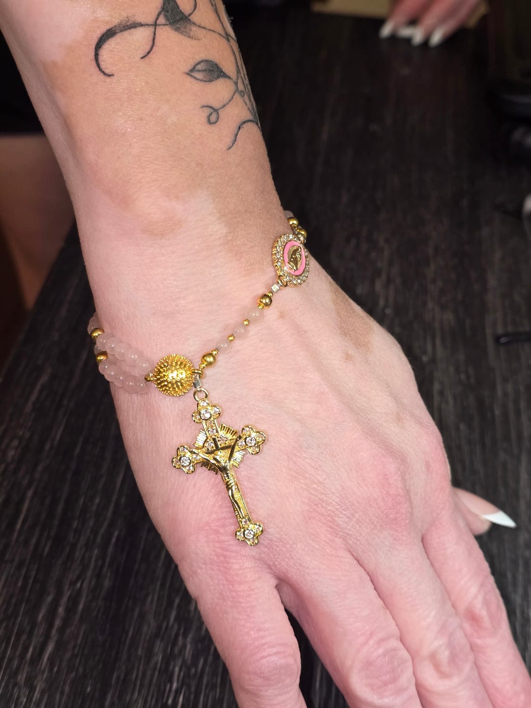 Customer photo review of Christianartworkshop Magnetic Strawberry Agate Rosary Bracelet: Emblem of Divine Grace & Purity