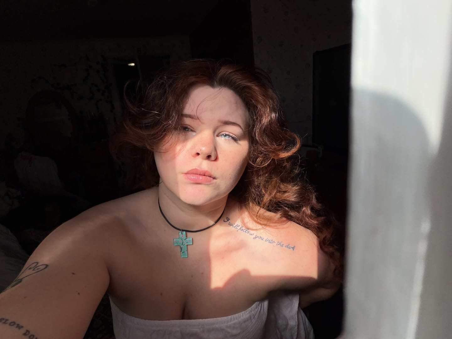 Customer photo review of Ginseng Cross Necklace