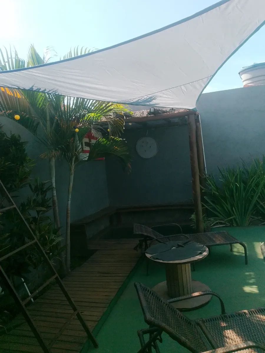 Customer photo review of Toldo Triangular Impermeável Anti-UV para Áreas Externas