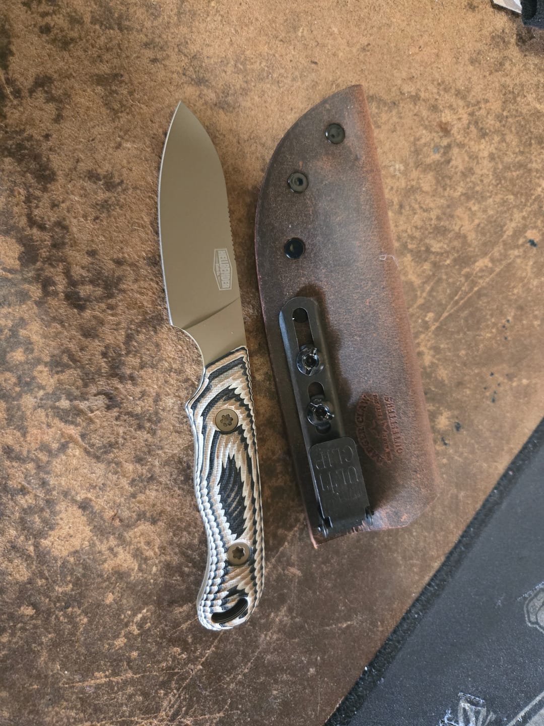 Customer photo review of Hellbender Ranch Hand, 3.6" CPM-MagnaCut Sheepsfoot, Coyote Cerakote, Multicolored G10, Leather Sheath, Made in USA (HB-RANCHHAND-COY-TRI-LTHR)