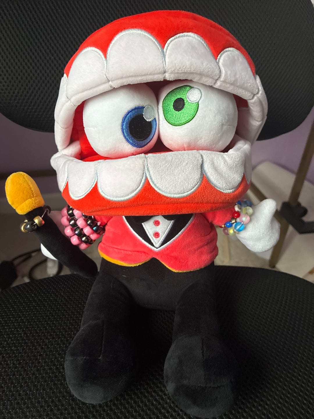 Customer photo review of Caine Plush