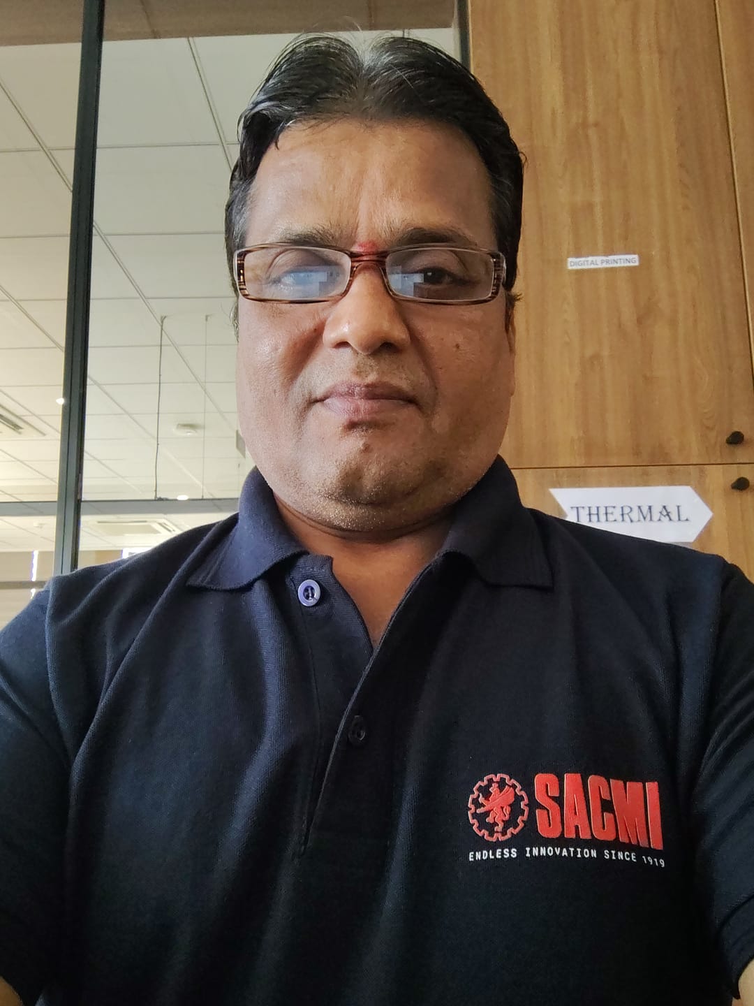 Customer photo review of Customized Polo T-Shirt With Your Company Logo | Order Logo Printed Tees | PrintMine.in