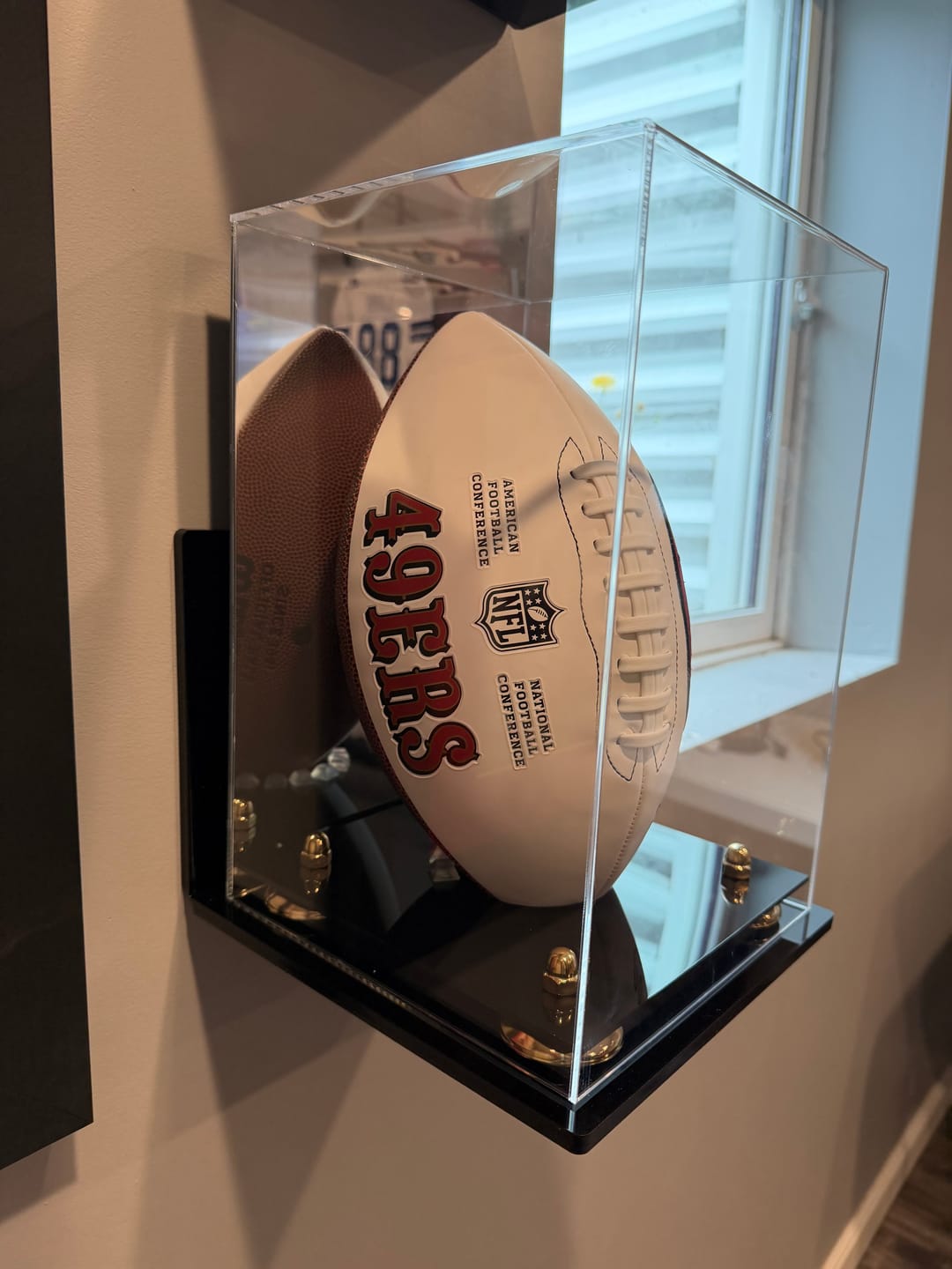 Customer photo review of Full-Size Football Display Case Vertical - Mirror Wall Mounts (A060/B42)