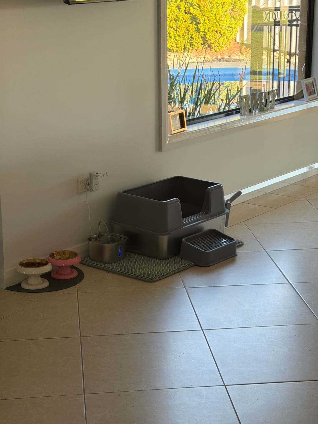 Customer photo review of Stainless Steel Cat Litter Box Large Semi-Enclosed Easy Cleaning Pet Toilet