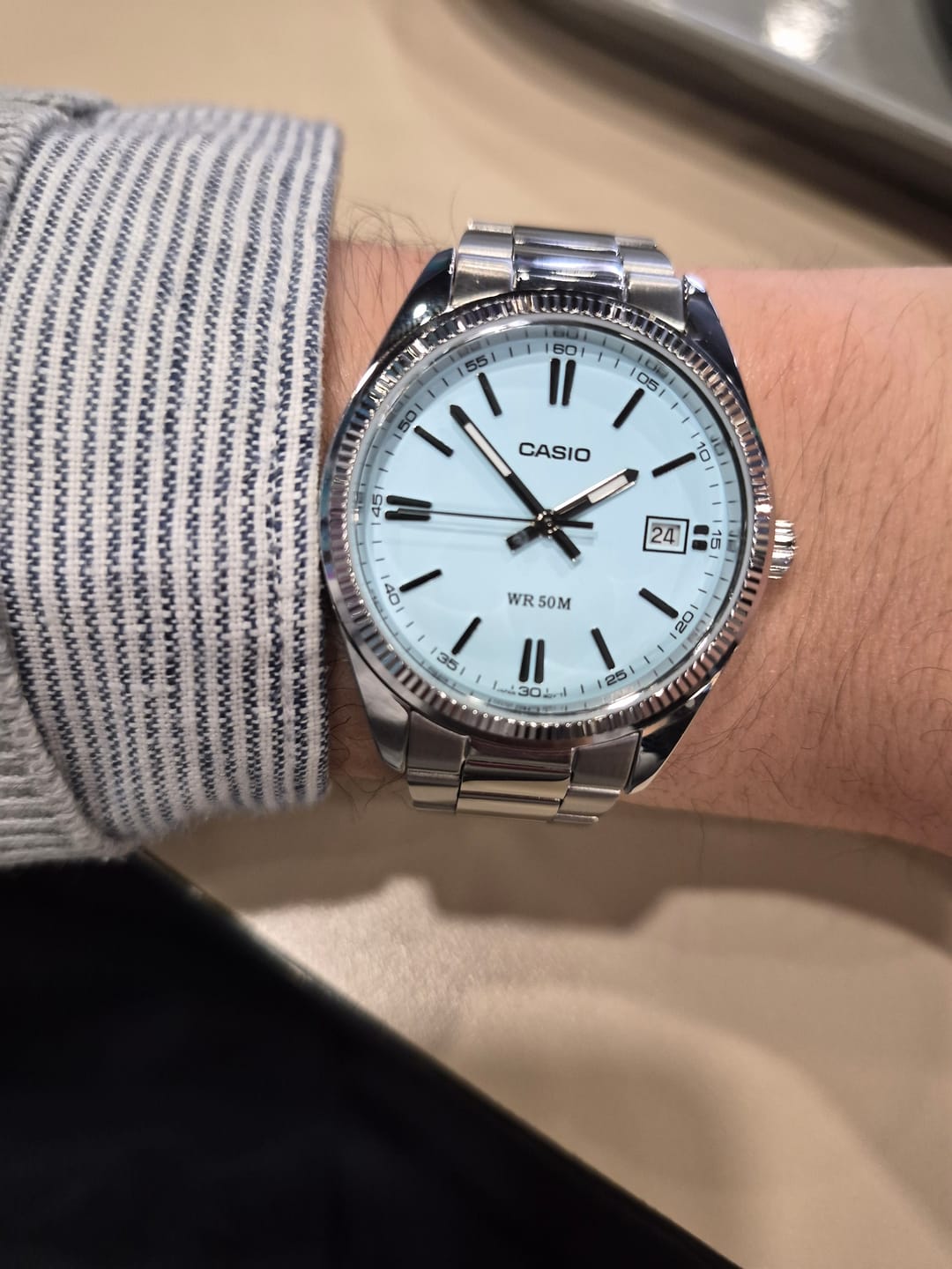 Customer photo review of Reloj Casio Análogo UTP-1302PD-2A2V Celeste Invierno 35mm