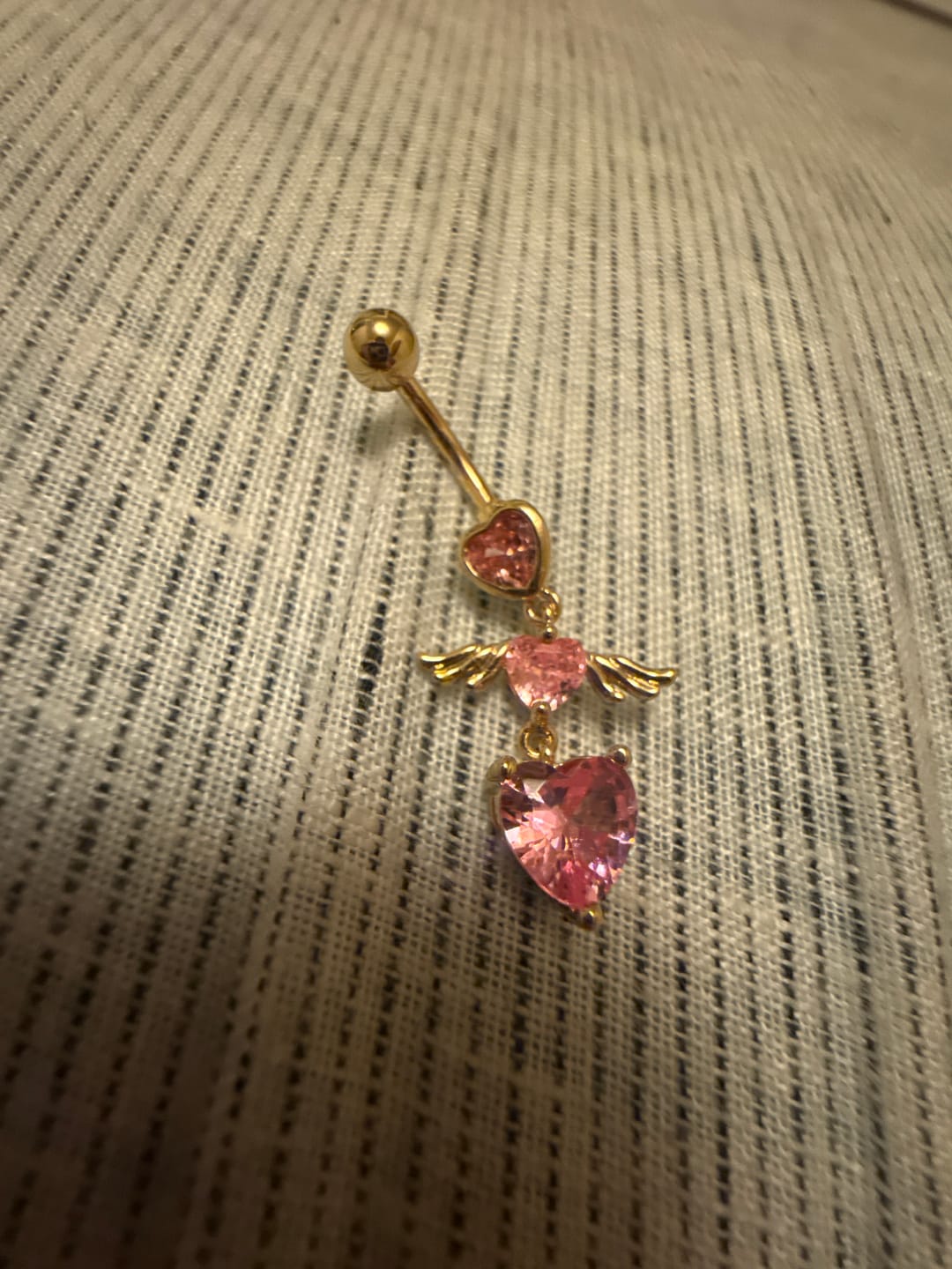 Customer photo review of Sent To Heaven Angel Heart Belly Rings