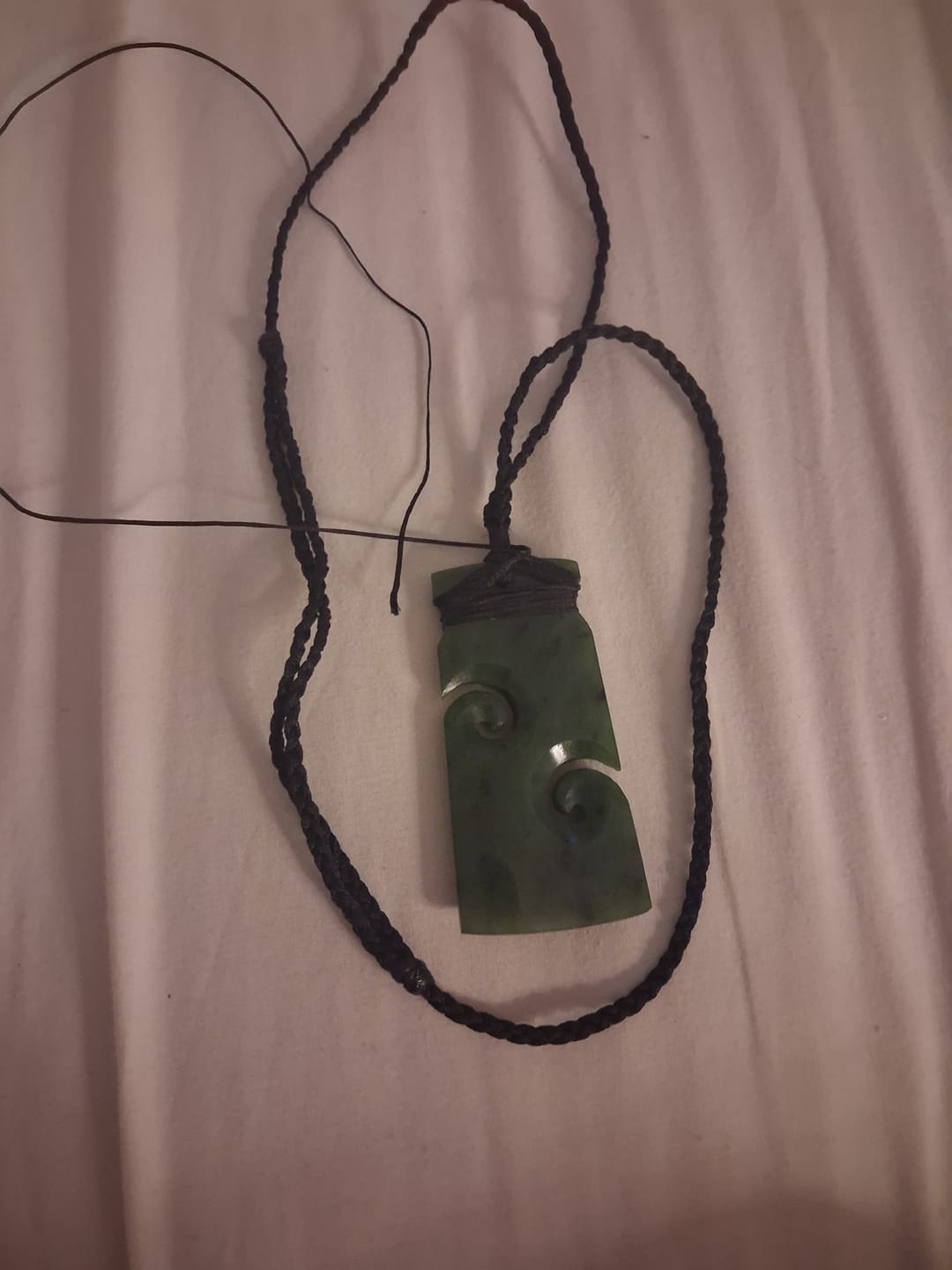 Customer photo review of Genuine NZ Greenstone Māori Toki Necklace with Koru