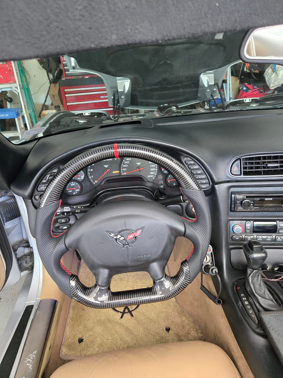Customer photo review of 1997-04 Corvette C5 Carbon Fiber Steering Wheel Black Perforated Leather Red Center Stripe