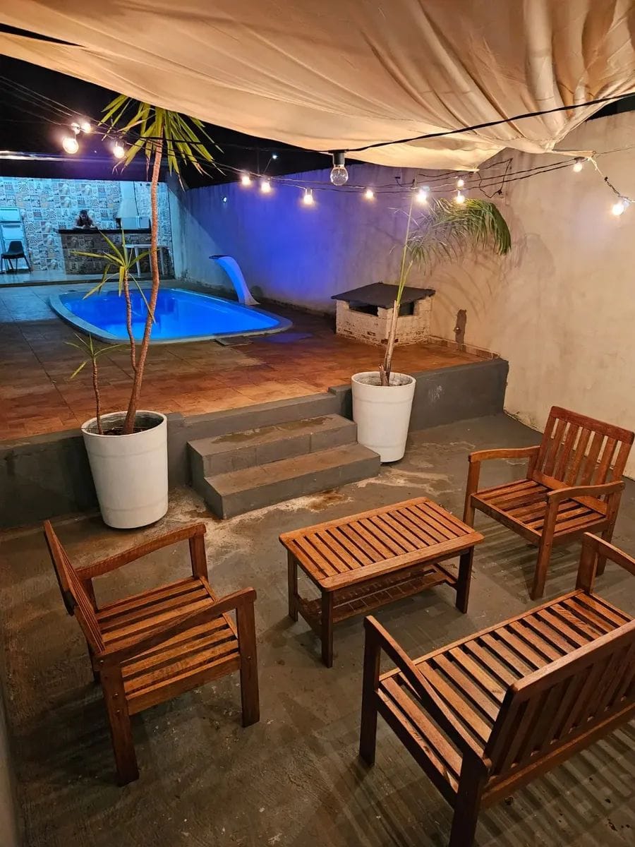 Customer photo review of Toldo Triangular Impermeável Anti-UV para Áreas Externas