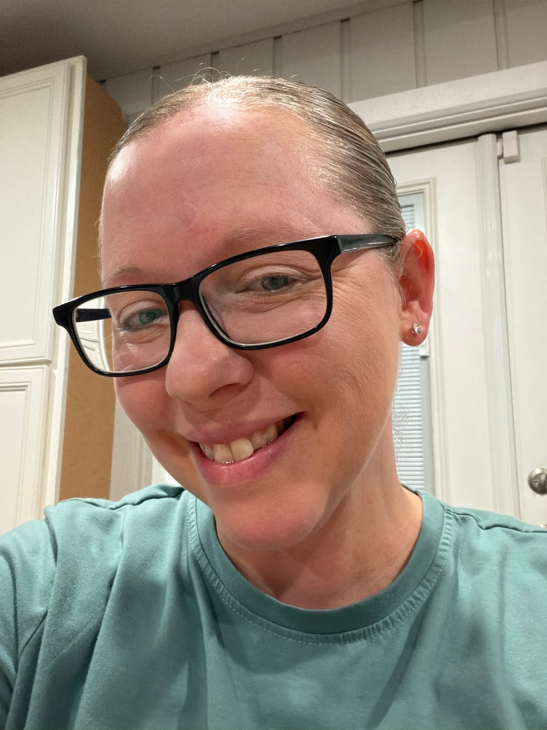 Customer photo review of Petite Faux Diamond Studs Hypoallergenic Earrings for Sensitive Ears with Plastic Posts