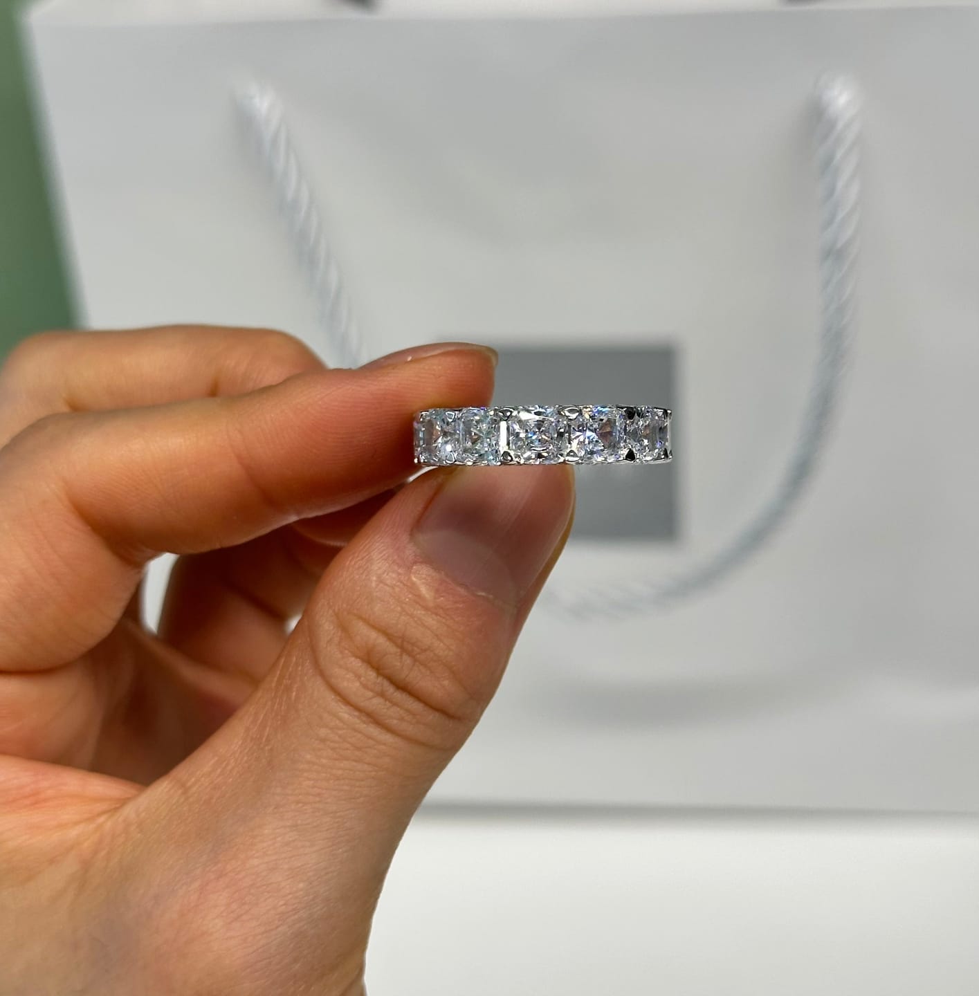 Customer photo review of S925 Luxurious 6.0Ct Cushion Cut Women's Wedding Band In Sterling Silver
