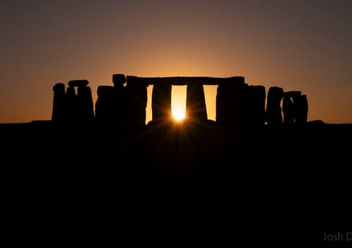 Customer's artistic photo of the Stonehenge monument during sunrise, shared in review for Fusion Gummies.