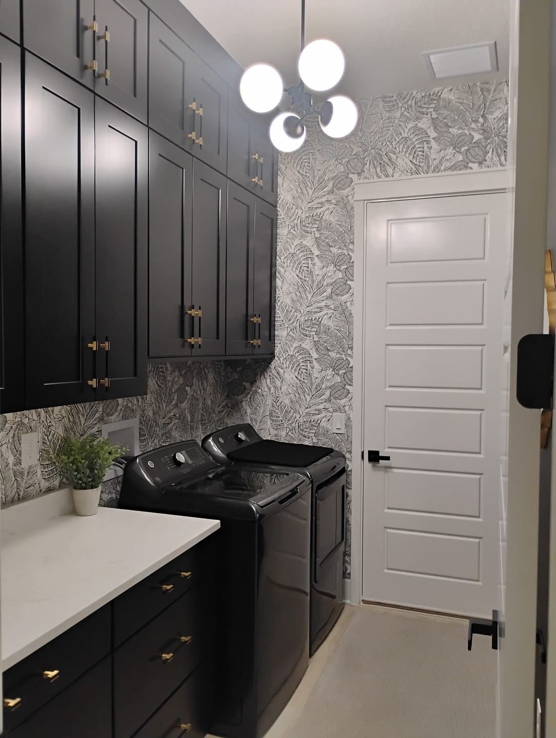 Customer photo review of A-Street Prints 4034-72115 Brentwood Black Palm Leaves Wallpaper by Scott Living