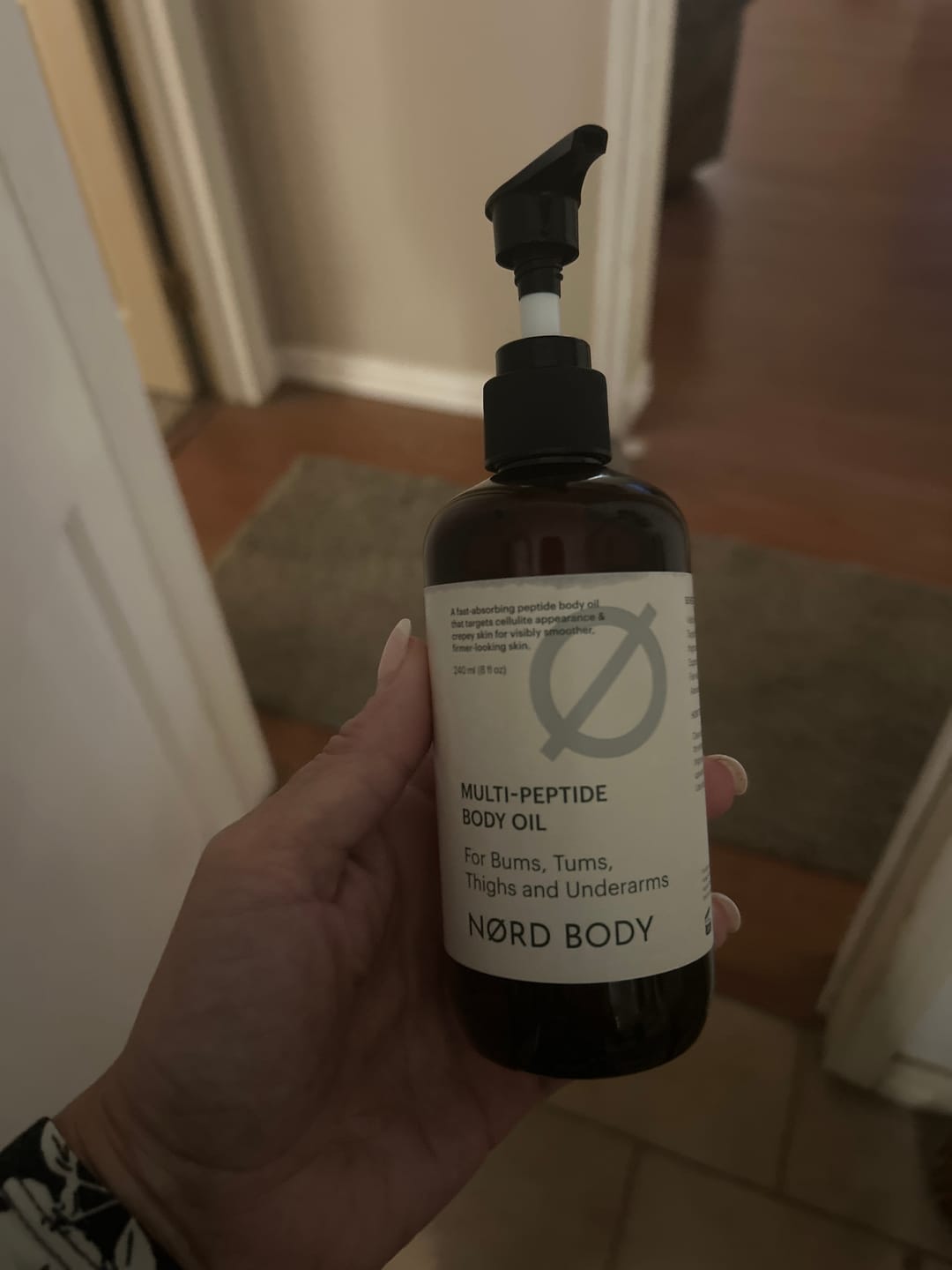 Customer photo review of NØRD BODY Peptide Body Oil