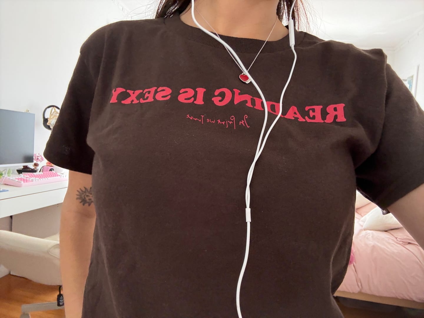 Customer photo review of reading is sexy baby tee